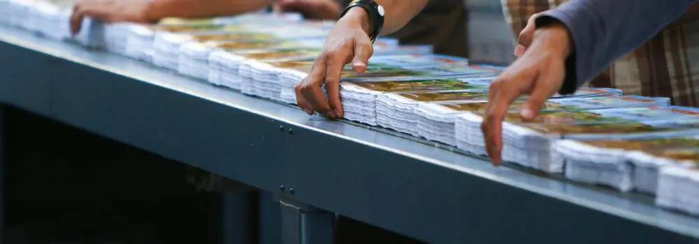 Stacks of brochures in commercial print production