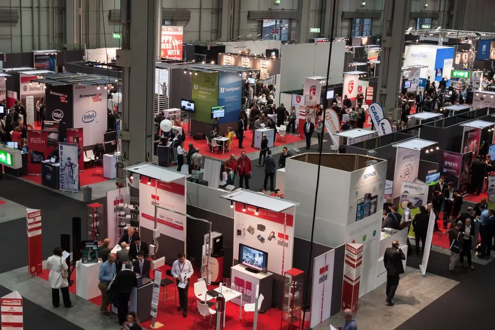 Large tradeshow floor with exhibition booths